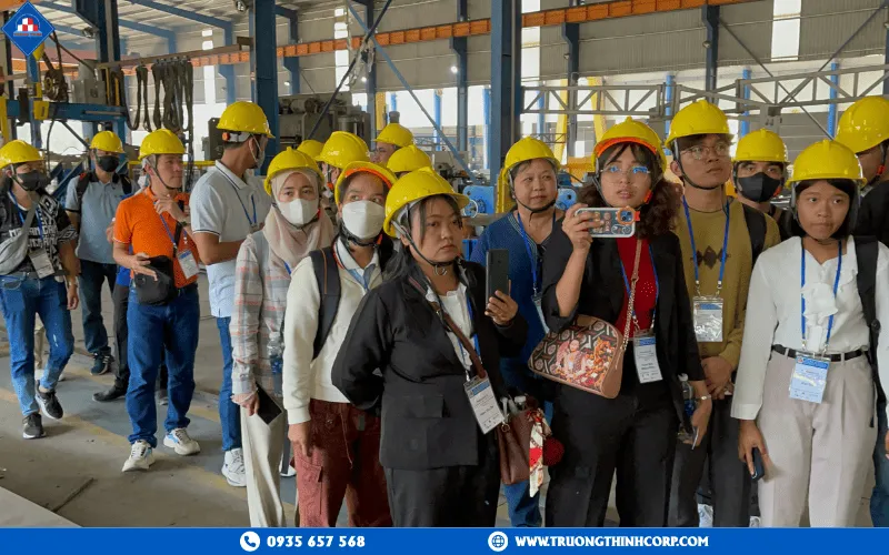 Delegation listens to an explanation of the production process