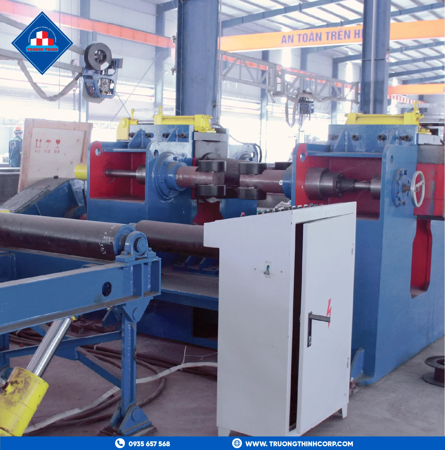 Beam-straightening machine correcting camber on a fabricated steel beam at Truong Thinh Corp