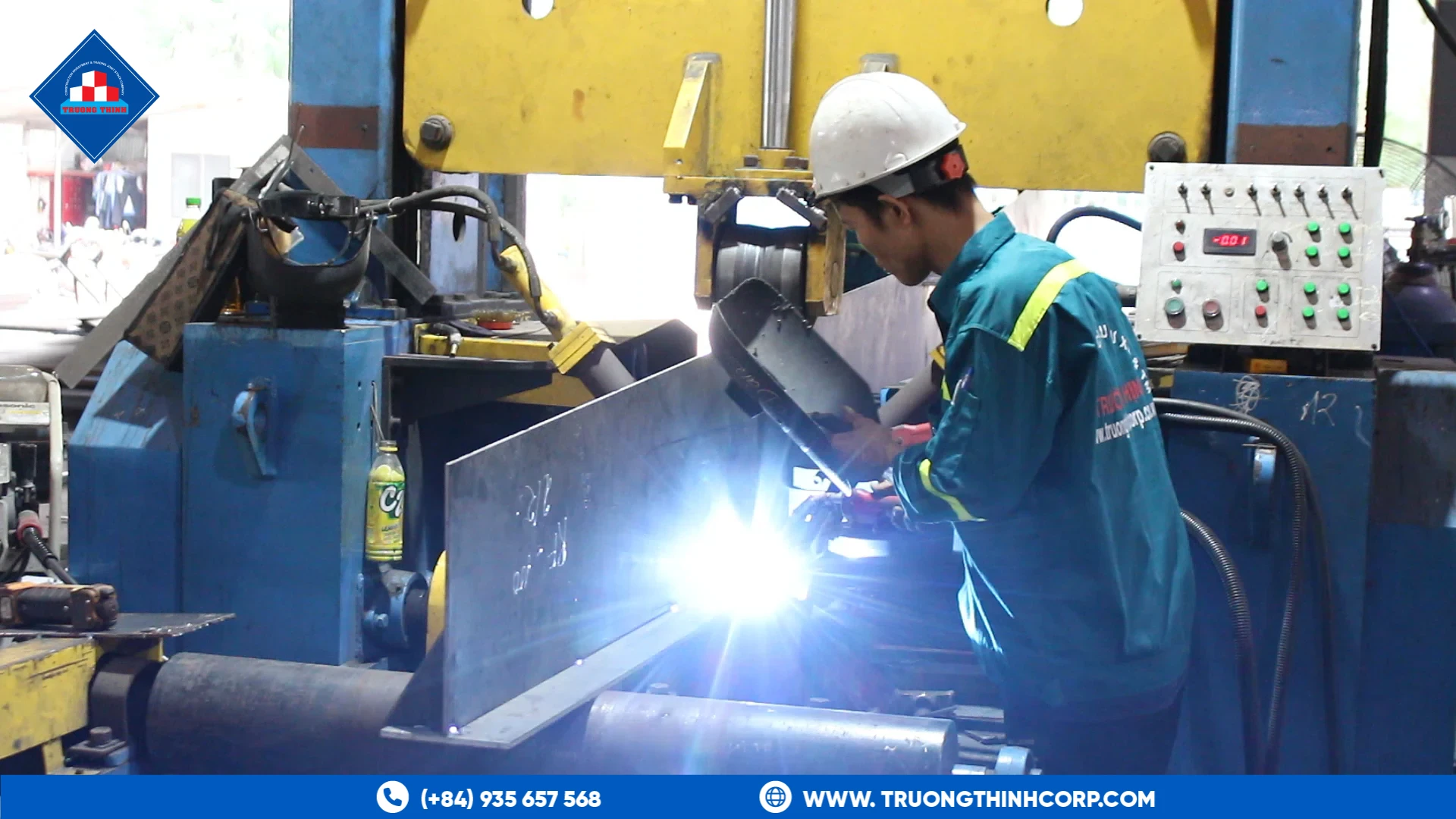 Welder working on a gantry welding line at Truong Thinh Corp's factory
