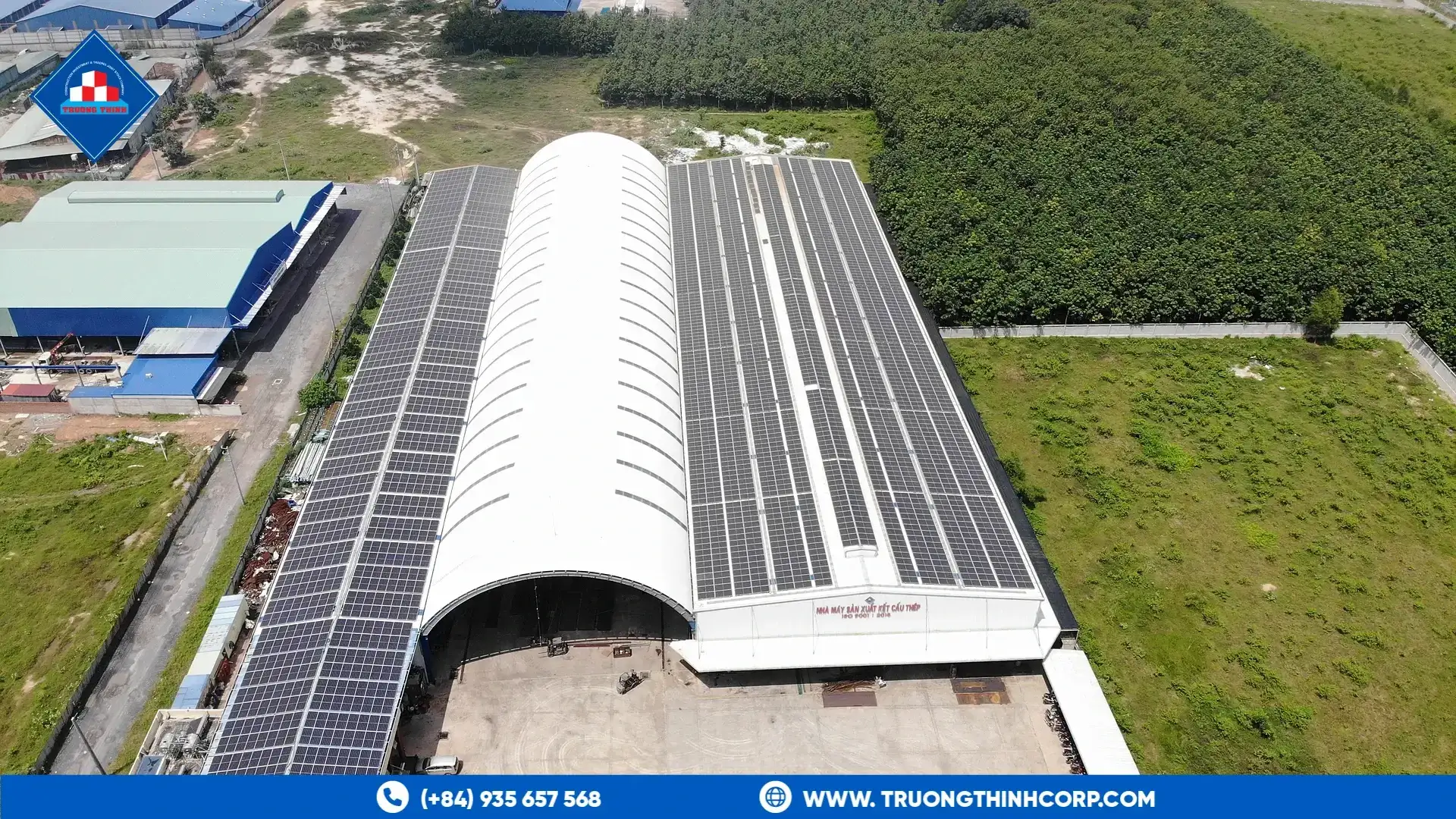 Aerial view of the arched steel factory building at Truong Thinh Corp