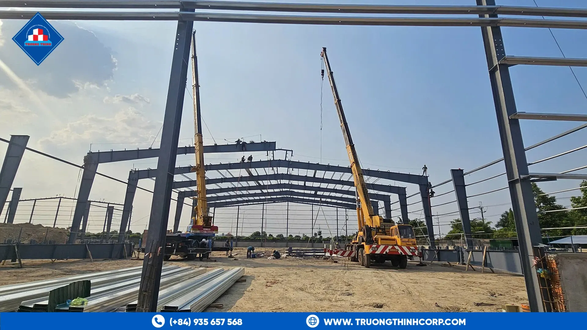 Steel frame erection with cranes at the Highland Star feed mill project