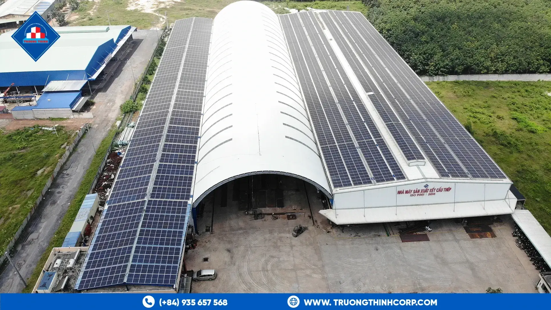 Aerial view of the arched steel factory building at Truong Thinh Corp