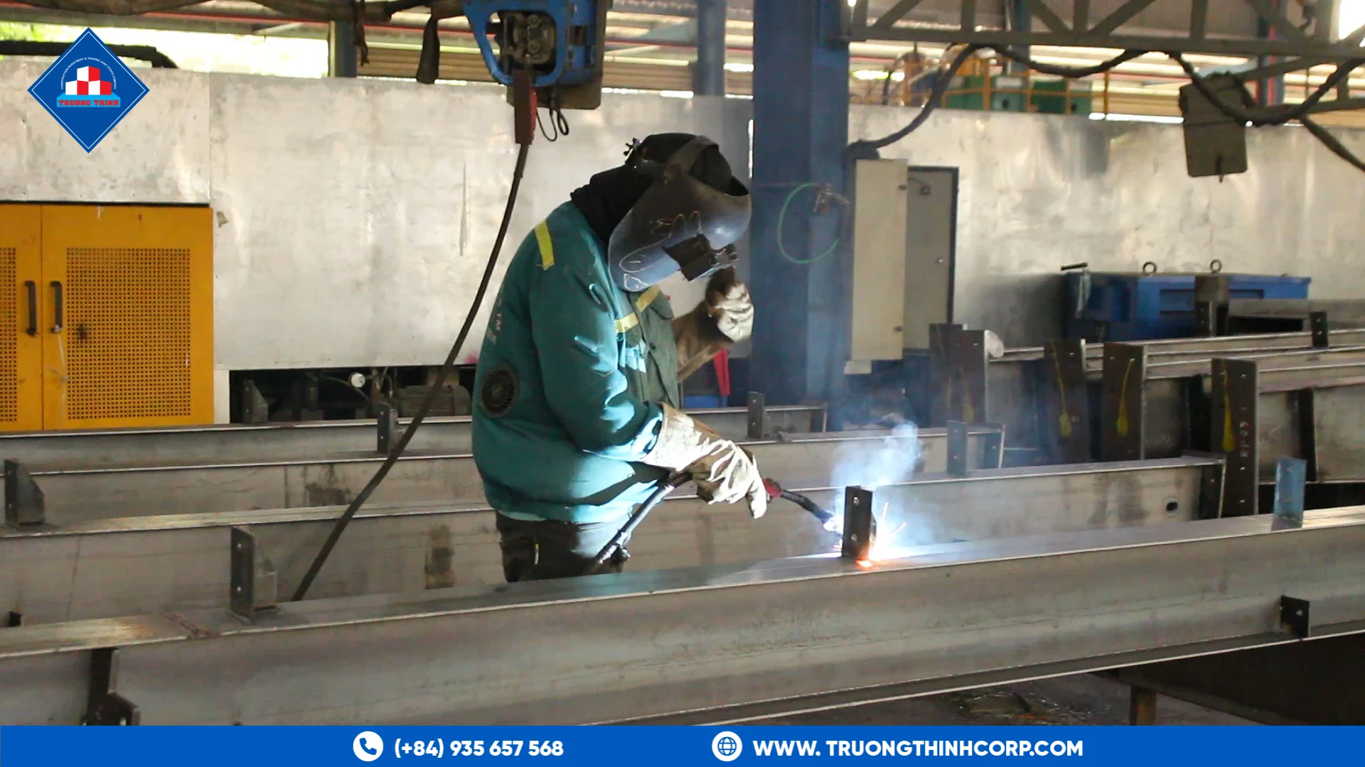 Welder finishing a structural steel section at Truong Thinh Corp's fabrication factory