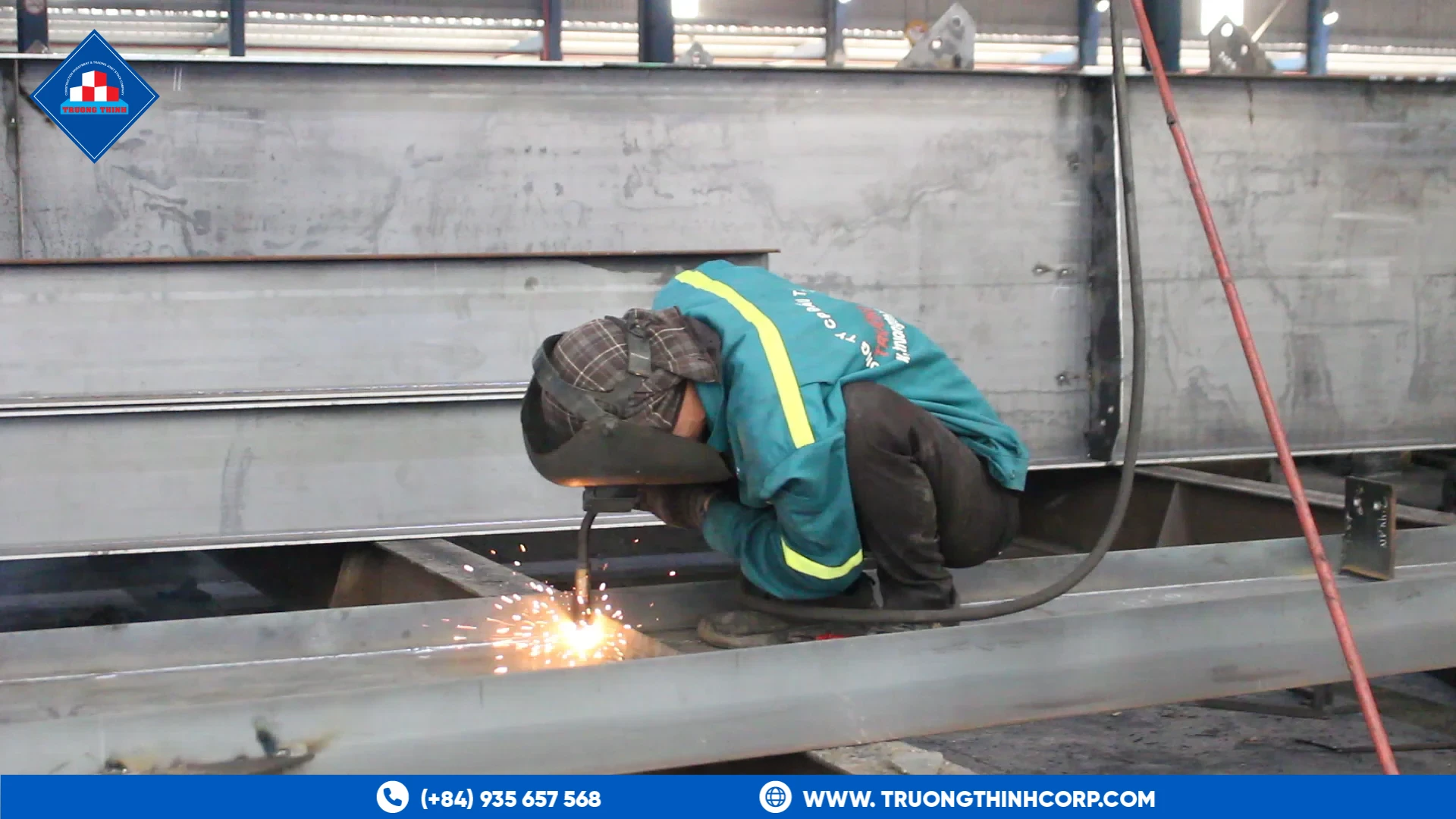 Welder finishing a structural steel connection at Truong Thinh Corp's factory