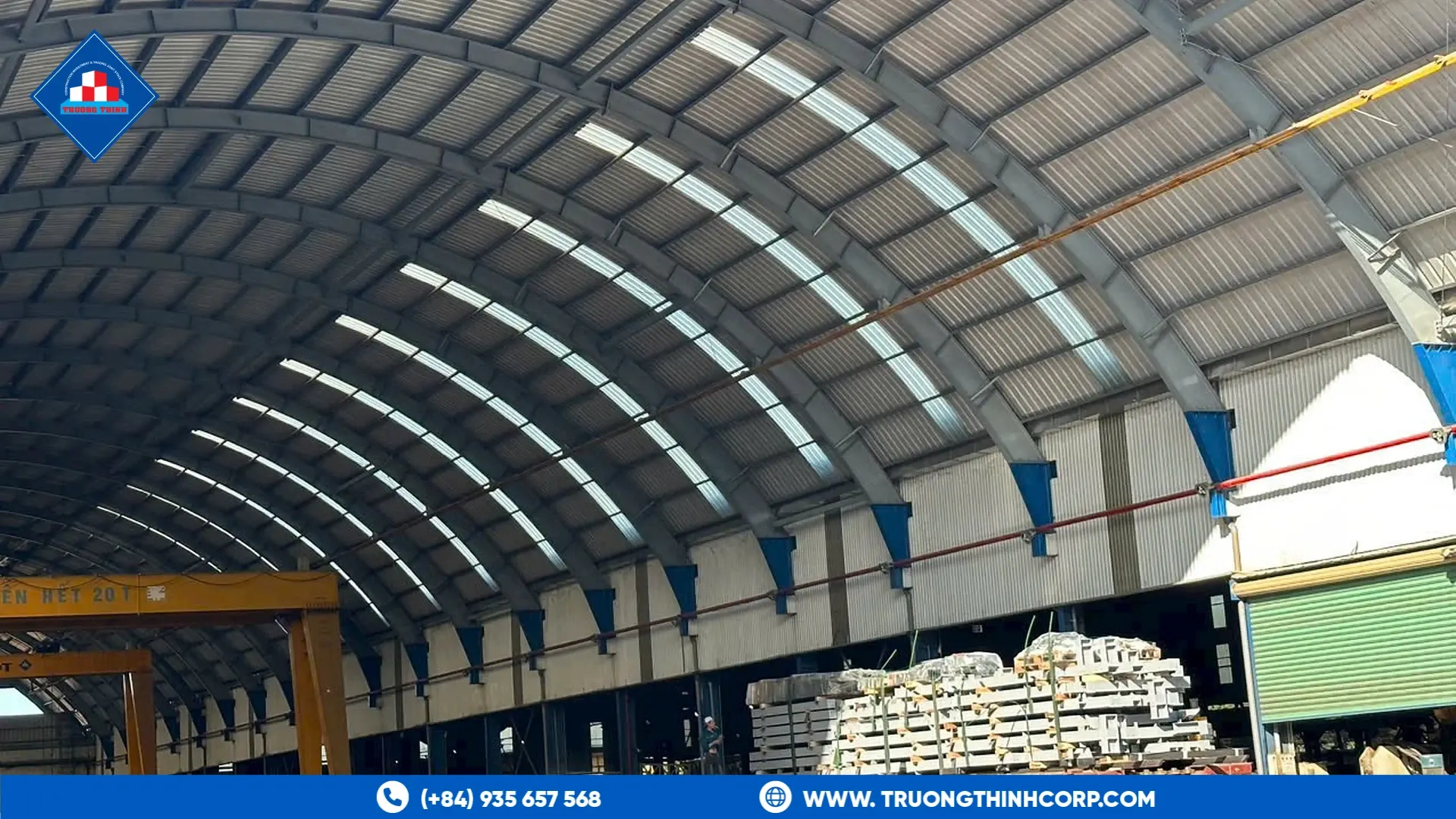 Wide-bay arched steel factory interior at Truong Thinh Corp's fabrication plant