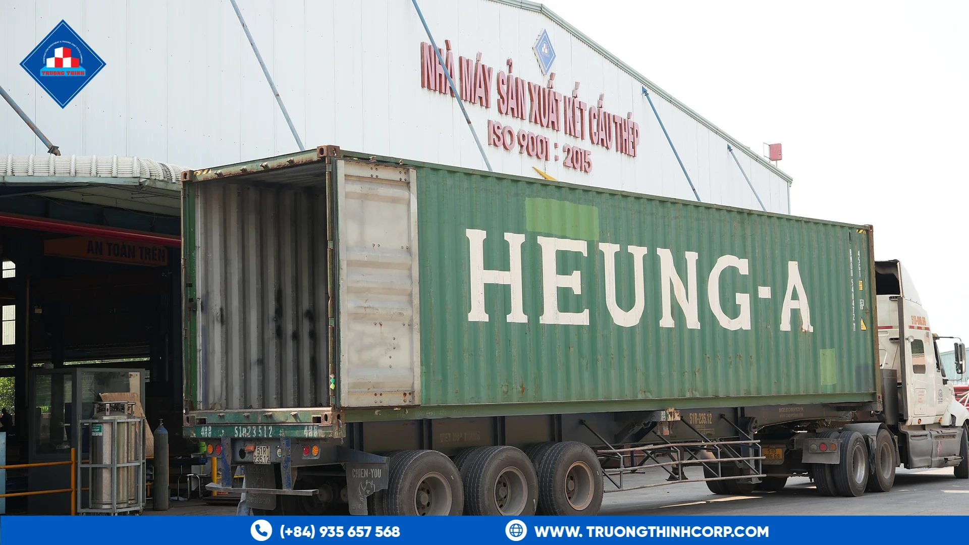 Container truck loading fabricated steel structure components for export at Truong Thinh Corp
