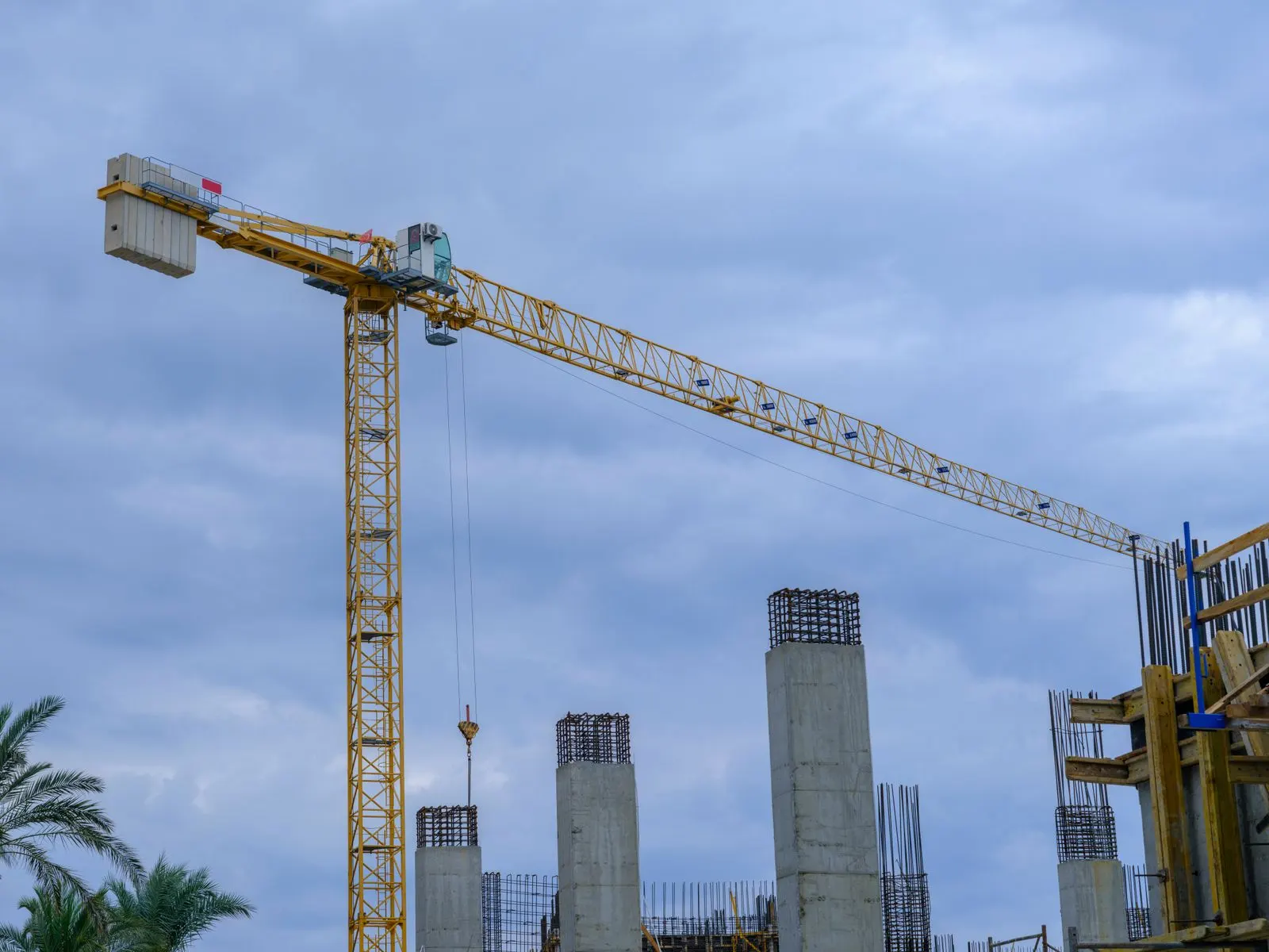 Tower crane on a high-rise building construction site