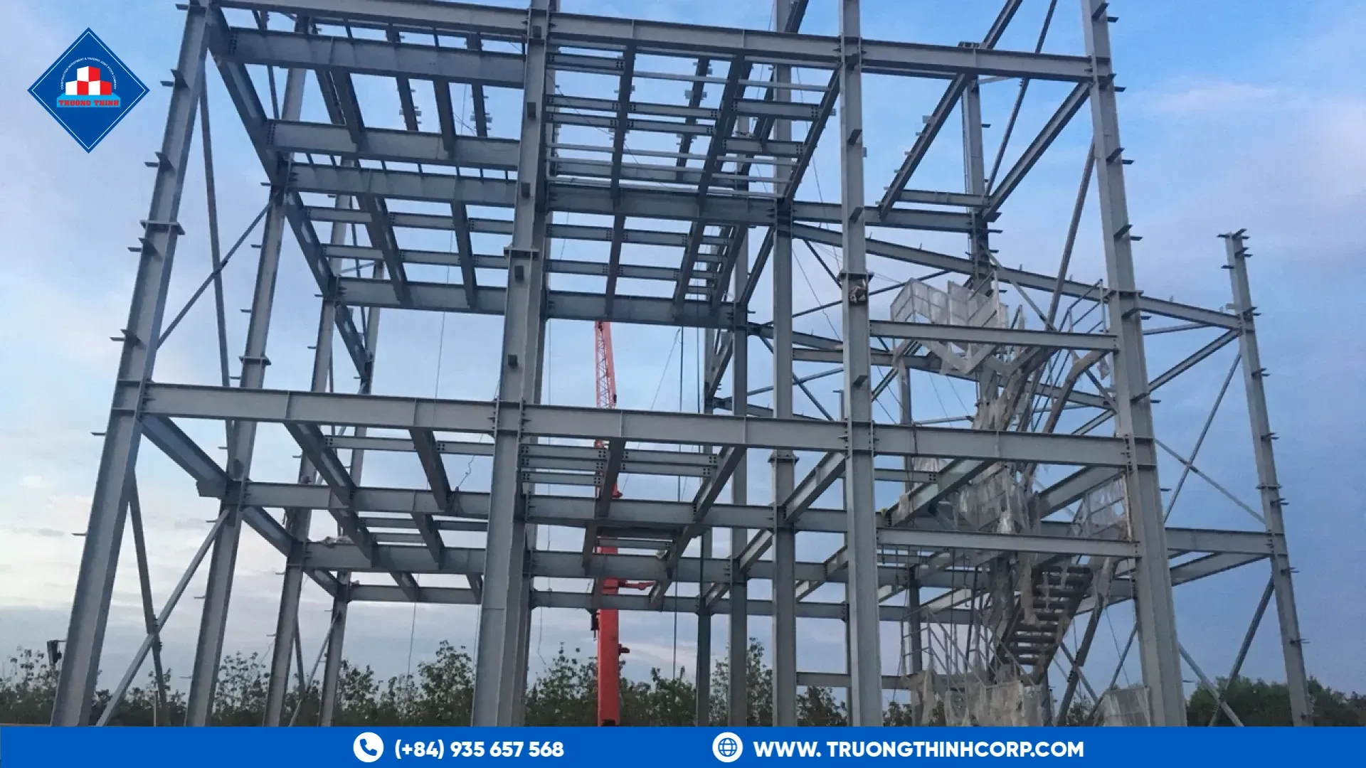 Multi-level steel frame of the processing tower at the DABACO feed mill in Binh Phuoc during erection