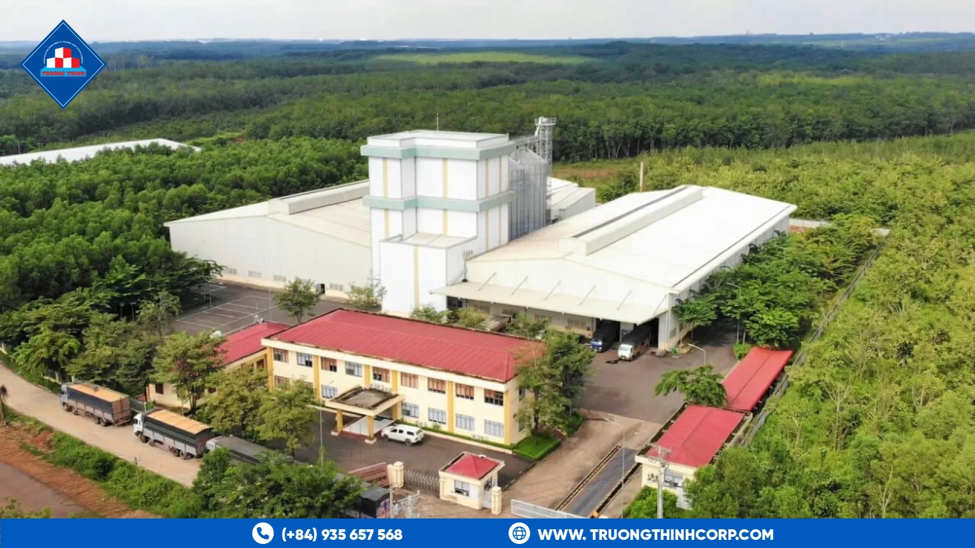 Aerial view of the DABACO animal feed plant with silos, a Truong Thinh Corp steel-structure reference project in Binh Phuoc